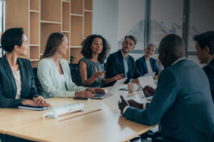 Image of team discussing healthcare policy.